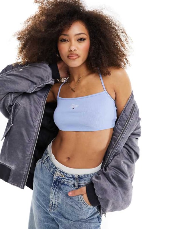 Tops by Tommy Jeans Can't top this Halterneck style Logo embroidery Cross-back straps Cropped length Slim fitSold By: Asos