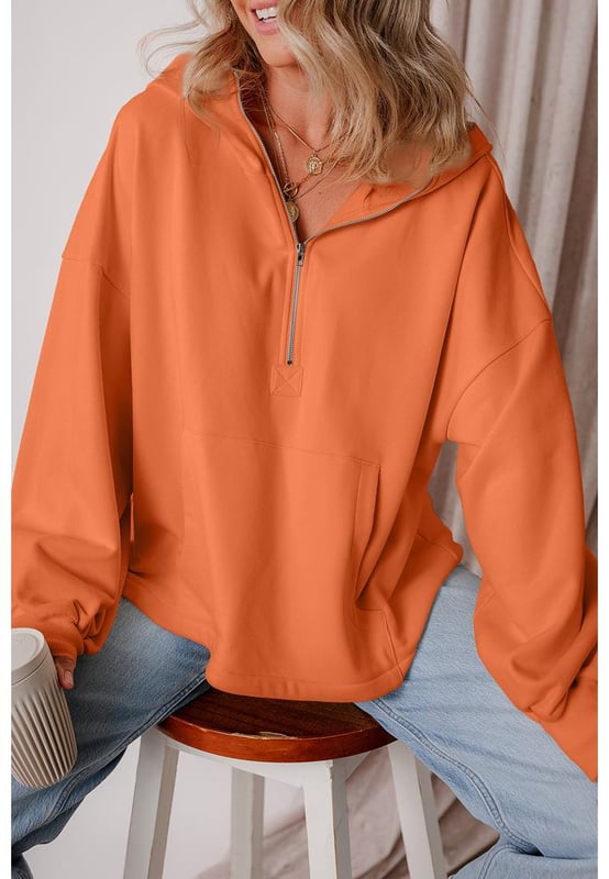 Orange fleece lined hoodie
  Half zipper for easy wear
  Functional kangaroo pockets to keep essentials close
  Fleece
  lined design for added comfort
  Medium elasticity
  Perfect for casual outings or lounging
  Refer to size chart for perfect fit
Material: 50% Polyester 50% Cotton