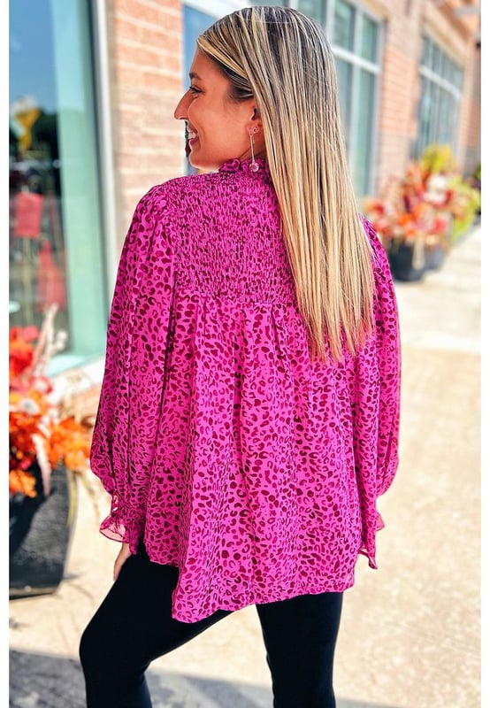 Flowy and lightweight fabric
  Shirred detailing and puff sleeves
  Bold leopard print pattern
  Versatile and can be dressed up or down
  Available in sizes S
  XL
  Unisex
Material: 100% Polyester