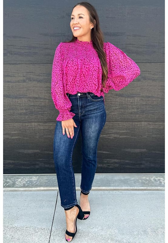Flowy and lightweight fabric
  Shirred detailing and puff sleeves
  Bold leopard print pattern
  Versatile and can be dressed up or down
  Available in sizes S
  XL
  Unisex
Material: 100% Polyester