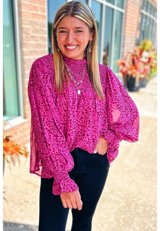 Flowy and lightweight fabric
  Shirred detailing and puff sleeves
  Bold leopard print pattern
  Versatile and can be dressed up or down
  Available in sizes S
  XL
  Unisex
Material: 100% Polyester