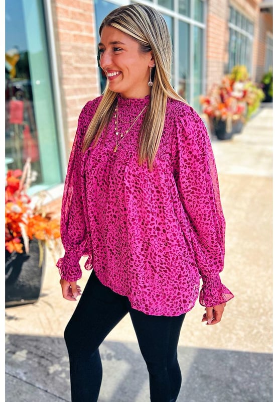 Flowy and lightweight fabric
  Shirred detailing and puff sleeves
  Bold leopard print pattern
  Versatile and can be dressed up or down
  Available in sizes S
  XL
  Unisex
Material: 100% Polyester