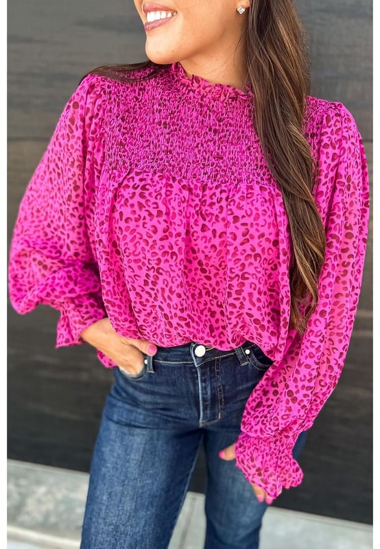 Flowy and lightweight fabric
  Shirred detailing and puff sleeves
  Bold leopard print pattern
  Versatile and can be dressed up or down
  Available in sizes S
  XL
  Unisex
Material: 100% Polyester