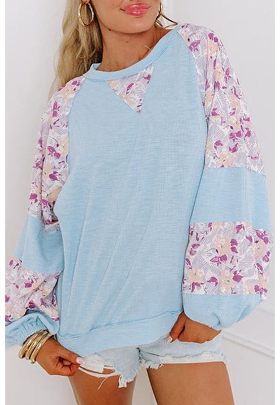 Sophisticated and stylish
  Floral patchwork design
  Elegant crew neck
  Balloon sleeves
  Trendy and fashion
  forward silhouette
  Must
  have item
  Available in different sizes
  Highly elastic
Material: 62% Polyester 32% Cotton 6% Elastane