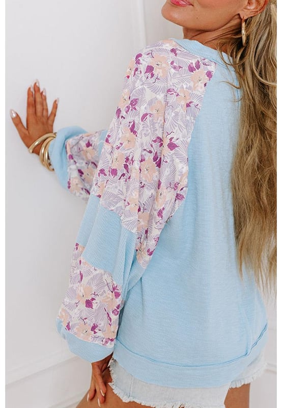 Sophisticated and stylish
  Floral patchwork design
  Elegant crew neck
  Balloon sleeves
  Trendy and fashion
  forward silhouette
  Must
  have item
  Available in different sizes
  Highly elastic
Material: 62% Polyester 32% Cotton 6% Elastane