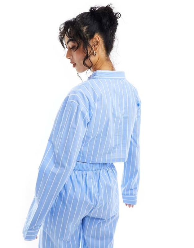 Lingerie & Nightwear by Luna Part of a co-ord set Trousers sold separately Spread collar Long sleeves Button placket Chest pockets Oversized fitSold By: Asos