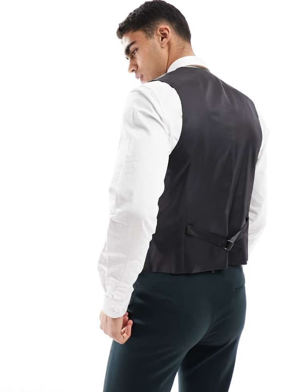 ASOS DESIGN slim suit waistcoat in dark green Suits by ASOS DESIGN Do the smart thing V-neck Button placket Contrast back with an adjustable cinch Slim fitSold By: Asos