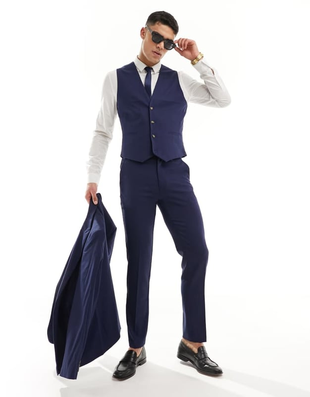 Suits by ASOS DESIGN Do the smart thing V-neck Button placket Pocket details Contrast back with an adjustable cinch Slim fitSold By: Asos