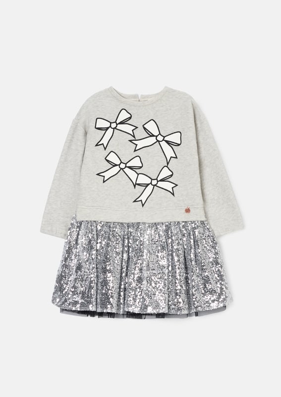 Is it a sweatshirt. is it a dress?… It's both! And it's fabulous! A super soft cotton sweat top with a bow print and a fully embellished   sequin skirt. The perfect hybrid of smart casual.