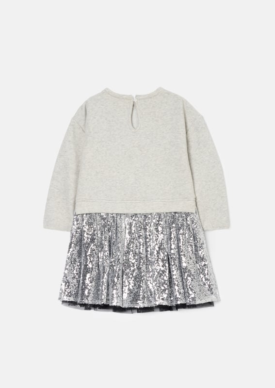 Is it a sweatshirt. is it a dress?… It's both! And it's fabulous! A super soft cotton sweat top with a bow print and a fully embellished   sequin skirt. The perfect hybrid of smart casual.