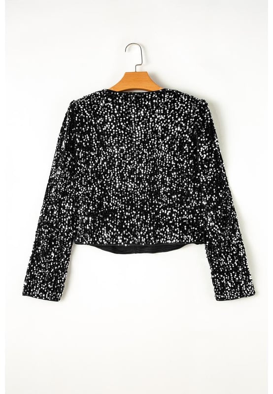 Black sequined design for a glamorous look
  Open front for versatile styling
  Long sleeves for coverage and chic silhouette
  Perfect to pair with skirts jeans pants and shorts
  Captivating patterns and textures
Material: 100% PET