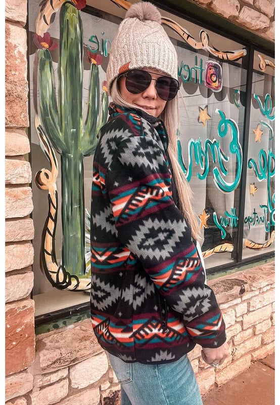 Vibrant Aztec print adds a touch of boho flair
  Convenient zip
  up design for easy wearability
  Stylish collar enhances the jackets chic appeal
  Side pockets provide practical storage options
Material: 100% Polyester