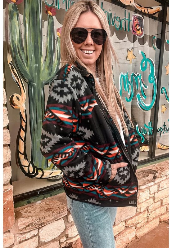 Vibrant Aztec print adds a touch of boho flair
  Convenient zip
  up design for easy wearability
  Stylish collar enhances the jackets chic appeal
  Side pockets provide practical storage options
Material: 100% Polyester