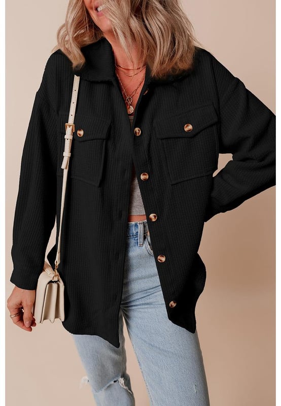 Black corduroy shacket
  Functional flap pockets
  Button
  up closure
  Shirt collar for a sophisticated touch
  Perfect for a cozy and stylish feel
Material: 75% Polyester 20% Viscose 5% Elastane