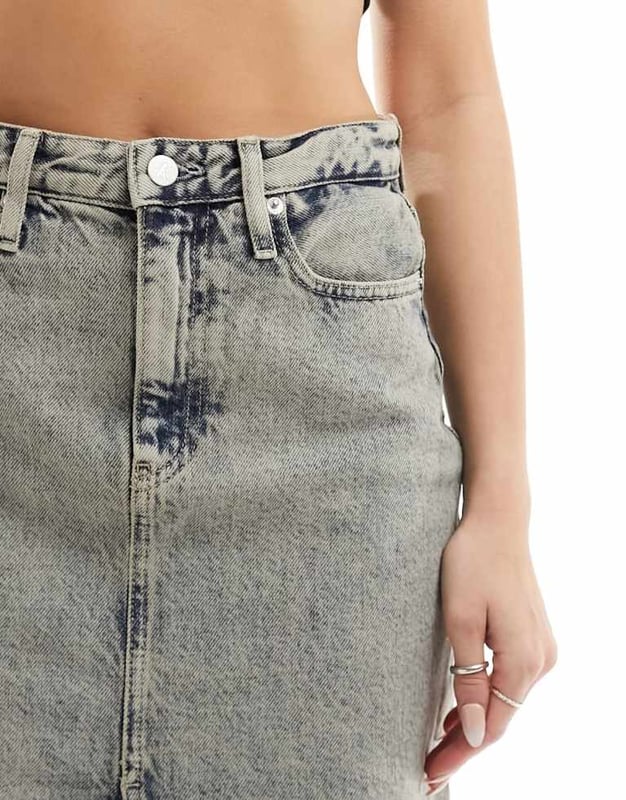 Skirts by Calvin Klein Jeans Lower-half looks High rise Belt loops Functional pockets Front split Regular fitSold By: Asos