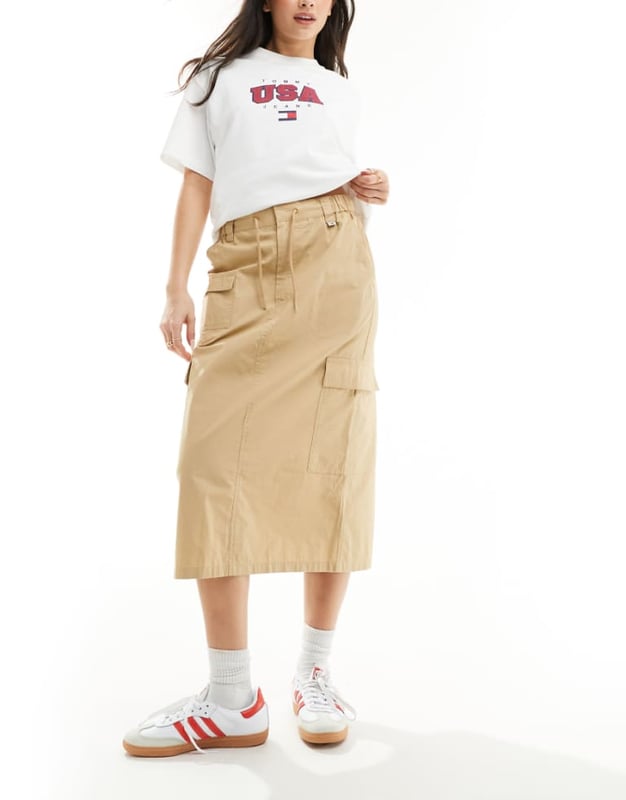 Skirts by Tommy Jeans Lower-half looks High rise Drawstring waist Functional pockets Kick split Regular fitSold By: Asos