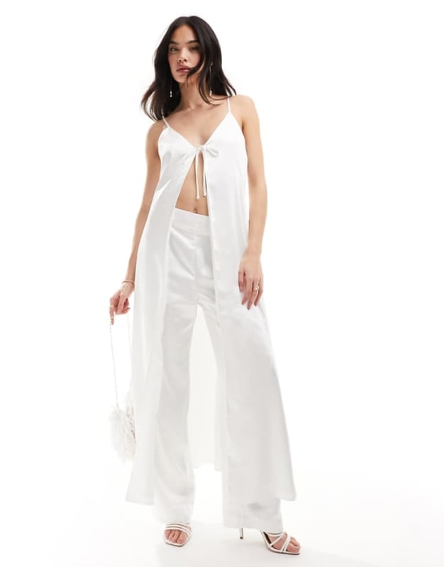 Tops by Y.A.S Part of a co-ord set Trousers sold separately V-neck Adjustable straps Tie front Regular fitSold By: Asos