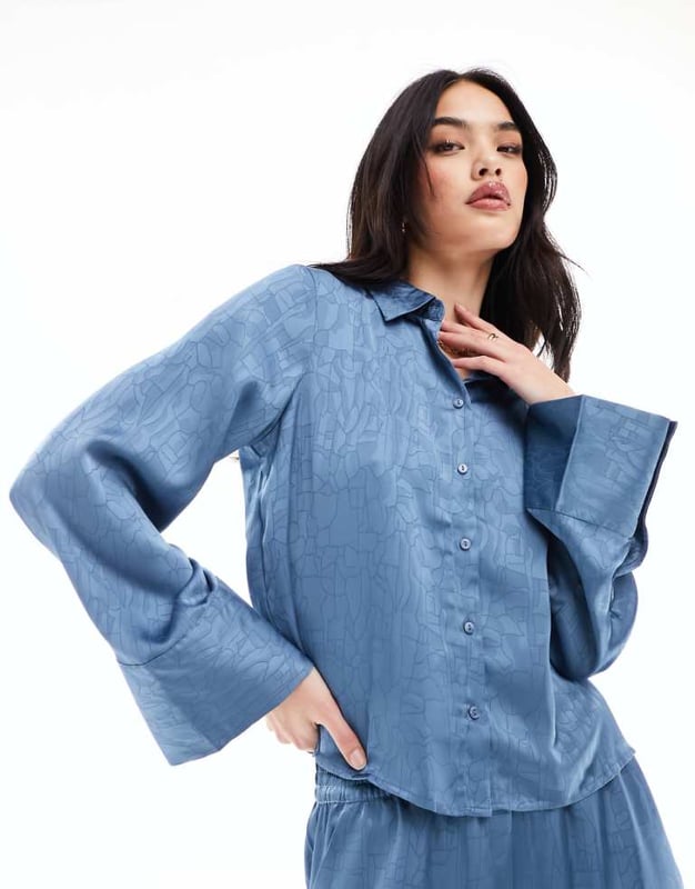 Tops by Vero Moda Part of a co-ord set Trousers sold separately Spread collar Button placket Wide cuffs Relaxed fitSold By: Asos