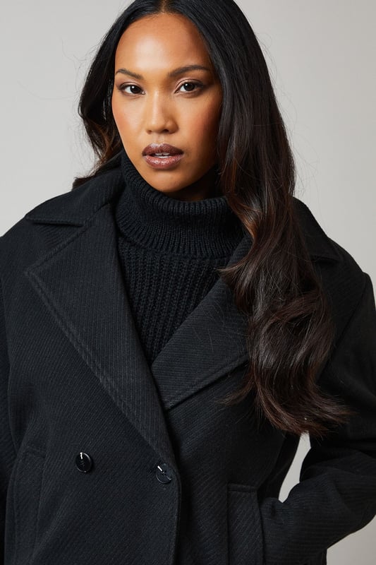 Double-breasted design for a classic, sophisticated look
        Distinctive collar detail adds a touch of elegance
        Versatile woven fabric suitable for various occasions
        Practical button fastenings for easy wear
        Relaxed fit allows for layering and comfort
    
    This Principles Collar Detail Double Breasted Jacket is a versatile piece that seamlessly blends timeless style with modern practicality. The double-breasted design and distinctive collar detail create a polished silhouette, perfect for elevating your casual ensembles. As seen on the model, pair this jacket with a cosy roll-neck jumper and wide-leg trousers for a chic, put-together look. The relaxed fit makes it ideal for layering over knitwear on cooler days, while the woven fabric ensures durability and ease of care. Suitable for a variety of casual events, from family gatherings to weekend outings, this jacket can be styled with both flats and low heels to suit your preference. The neutral hue allows for endless styling possibilities, making it a wardrobe staple that you'll reach for time and time again.