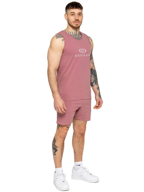 The Enzo Men's Gym Shorts are designed for performance and comfort. Featuring a regular fit, these shorts provide ease of movement while maintaining a stylish look. Made from stretch material with Lycra fabric, they offer flexibility and durability for intense workouts or casual wear. The Enzo Jeans printing on the right thigh adds a bold, athletic touch. Perfect for activewear, these shorts are ideal for the gym, running, or everyday training.(655)