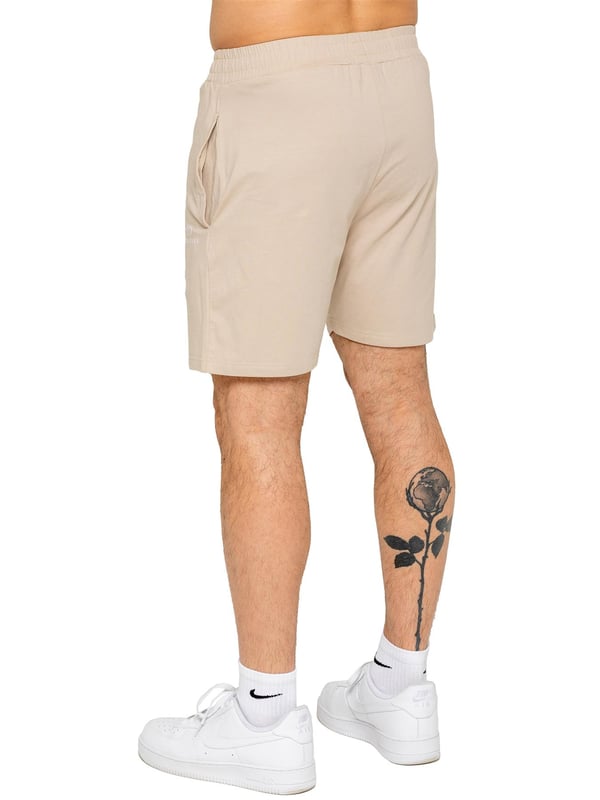 The Enzo Men's Gym Shorts are designed for performance and comfort. Featuring a regular fit, these shorts provide ease of movement while maintaining a stylish look. Made from stretch material with Lycra fabric, they offer flexibility and durability for intense workouts or casual wear. The Enzo Jeans printing on the right thigh adds a bold, athletic touch. Perfect for activewear, these shorts are ideal for the gym, running, or everyday training.(655)