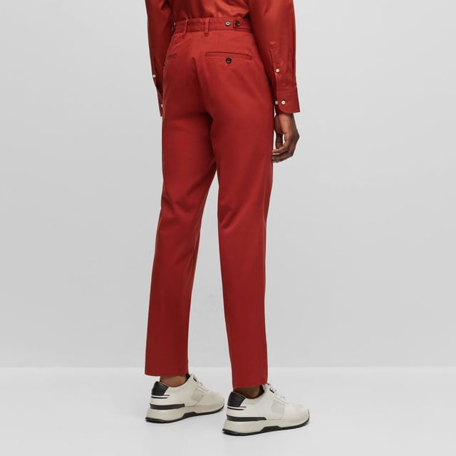 Mens BOSS C-Genius Trousers in red.- Zip fly and button fastening.- Side waistband adjusters.- Belt loops.- Slim fit.- 96% Cotton  4% Elastane- Ref: 50496128612