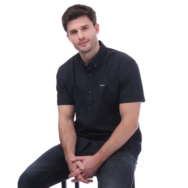 Men's Boss Short Sleeve Slim-Fit Shirt in Dark Blue Men's Boss Short Sleeve Slim-Fit Shirt.- Button down collar.- Short sleeves.- Full button fastening.- Embroidered BOSS logo on the chest.- Slim fit. Material: 96% Polyester, 4% Elastane. Ref: 50522755404.