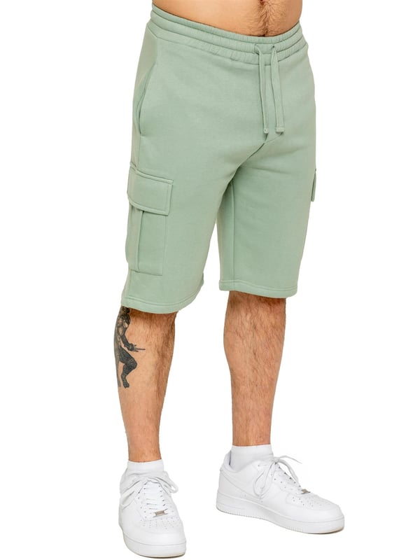 Experience comfort and style with Enzo's Men's Cargo Fleece Shorts. Made with brushed back inner fleece, these shorts offer a regular fit with 2 side pockets and 2 cargo pockets. The elasticated waistband, featuring the EZ logo, is adjustable with a drawstring for the perfect fit.