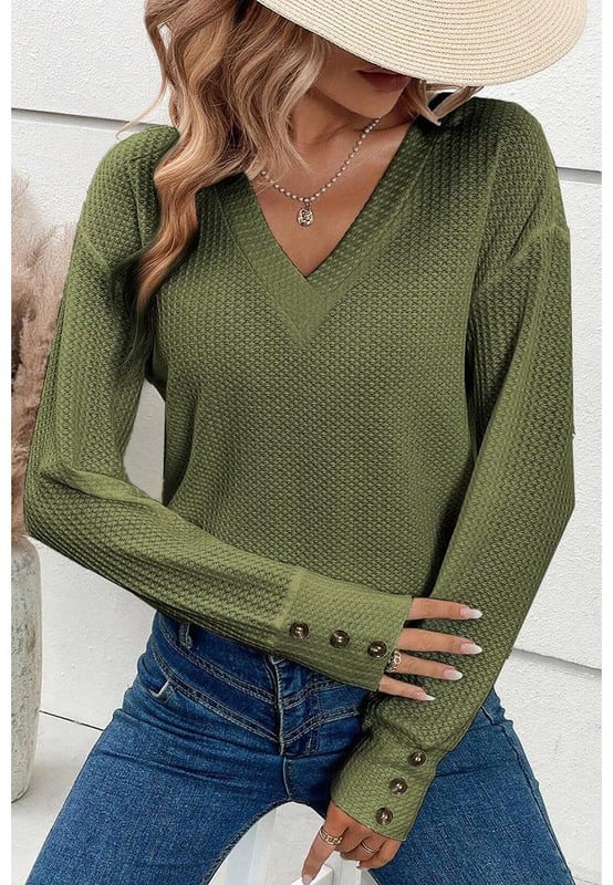 Jungle green textured knit top
  V neck with button cuffs
  Long sleeves
  Regular fit
  Versatile and easy to match with any outfit
  Unisex
Material: 70% Polyester 27% Viscose 3% Elastane