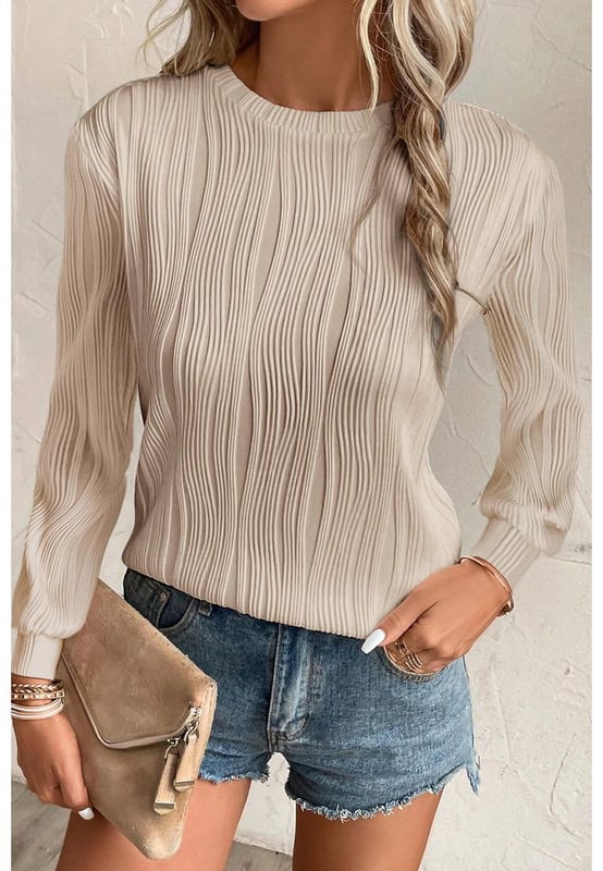 Apricot Textured Wavy Round Neck Long Sleeve Top
  Intricate wavy fabric for a distinctive tactile appeal
  Classic round neck suitable for most
  Timeless design that complements any casual wardrobe
  Concise style and solid color make it versatile to style
  Unisex top that pairs well with any fashionable jeans and pants
  Size chart available for your convenience
Material: 91% Polyester 9% Elastane
