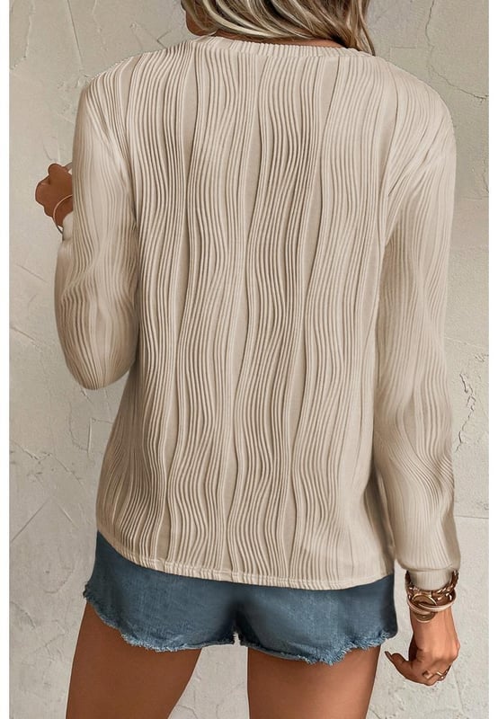 Apricot Textured Wavy Round Neck Long Sleeve Top
  Intricate wavy fabric for a distinctive tactile appeal
  Classic round neck suitable for most
  Timeless design that complements any casual wardrobe
  Concise style and solid color make it versatile to style
  Unisex top that pairs well with any fashionable jeans and pants
  Size chart available for your convenience
Material: 91% Polyester 9% Elastane