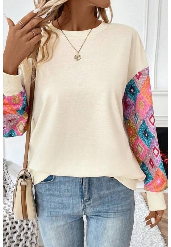 Eye
  catching geometric print
  Comfortable round neck
  Long sleeves design
  Flattering for most body shapes
  Easy to match with different bottoms
  Suitable for various occasions
Material: 65% Polyester 35% Cotton