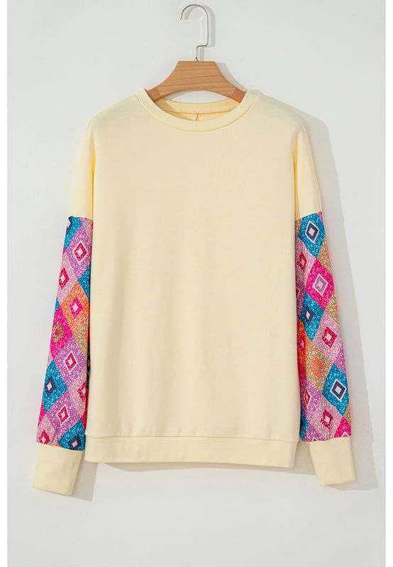 Eye
  catching geometric print
  Comfortable round neck
  Long sleeves design
  Flattering for most body shapes
  Easy to match with different bottoms
  Suitable for various occasions
Material: 65% Polyester 35% Cotton