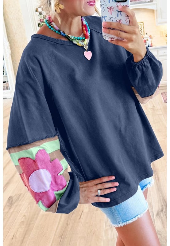 Sail Blue Flower Patchwork Raglan Sleeve Exposed Seam Oversized Top
  Stylish vintage flair with a mineral wash
  Long bubble sleeves with elastic cuffs
  Contrasting color stripe pattern on sleeves
  Exposed seams and raw cut details
  Loose
  fit silhouette friendly to most body shapes
  Available in different sizes
  Medium elasticity
  Dropship womens long sleeve tops from Dear
  Lover
Material: 85% Polyester 10% Cotton 5% Elastane