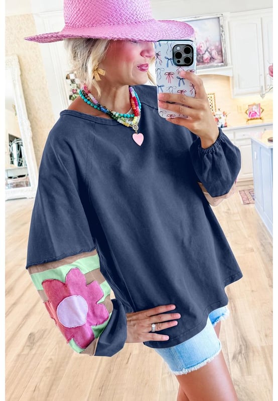 Sail Blue Flower Patchwork Raglan Sleeve Exposed Seam Oversized Top
  Stylish vintage flair with a mineral wash
  Long bubble sleeves with elastic cuffs
  Contrasting color stripe pattern on sleeves
  Exposed seams and raw cut details
  Loose
  fit silhouette friendly to most body shapes
  Available in different sizes
  Medium elasticity
  Dropship womens long sleeve tops from Dear
  Lover
Material: 85% Polyester 10% Cotton 5% Elastane