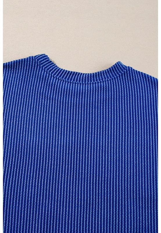 Celebra el día del juego con estilo con esta llamativa camiseta de manga larga con gráfico. Mantente cómodo y abrigado con la tela acanalada que añade una textura única. El diseño de cuello redondo ofrece un aspecto clásico y versátil para cualquier ocasión. Las mangas largas brindan calidez y cobertura adicional durante los días más frescos. Las camisetas de manga larga Dropship son perfectas para mostrar tu lado deportivo. Material: 75% Poliéster, 20% Viscosa, 5% Elastano.