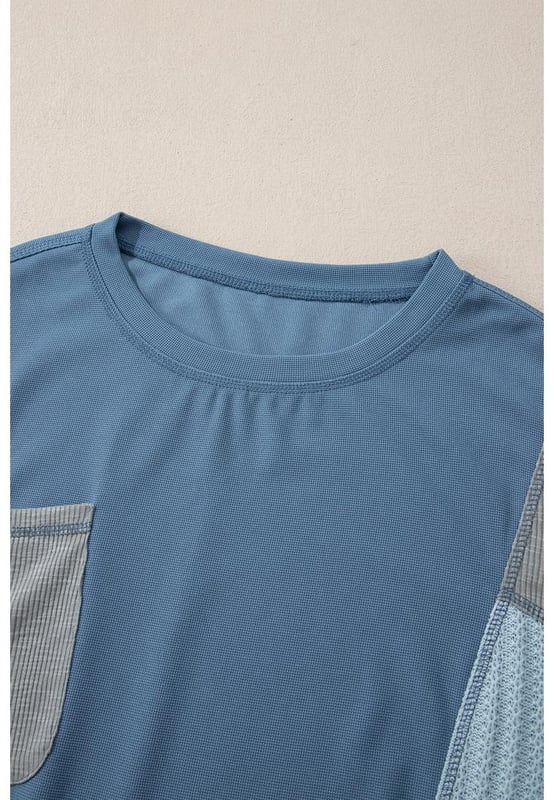 Farbe: Dämmerungsblau  
Langärmliges Oberteil  
Offene Nahtdetails  
Farbblockdesign  
Patchwork-Details  
Mit Knöpfen an den Ärmelabschlüssen  
Glatte und anpassbare Passform  
Unisex-Größen verfügbar  
Material: 97% Polyester, 3% Elasthan