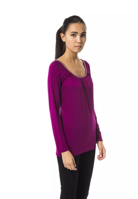 Purple Viscose Tops & T
  Shirt
  Open round neck design
  Long sleeves
  Soft and comfortable viscose fabric
  Versatile and stylish
  Perfect for casual and formal occasions
  Pair with jeans or a skirt for a chic look
  Must
  have addition to any womans wardrobe
Material: 95% Viscose 5% Elastane