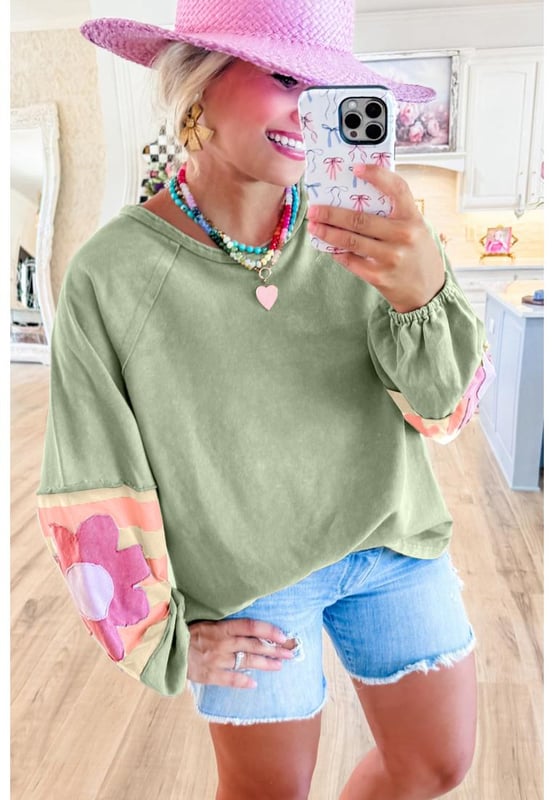 Smoke green flower patchwork design
  Raglan sleeves with elastic cuffs
  Contrasting color stripe pattern on sleeves
  Exposed seams detail
  Raw cut details of the loose fit silhouette
  Friendly to most body shapes
  Available in different sizes
  Unisex
Material: 85% Polyester 10% Cotton 5% Elastane
