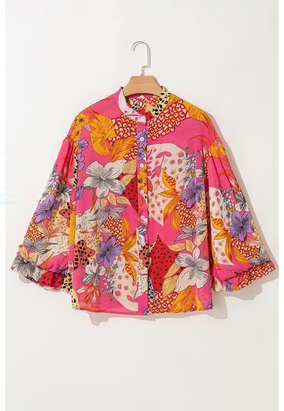 Red Abstract Floral Print
  Buttoned front
  Ruffled bubble sleeves
  Abstract floral print design
  Available in various sizes
Material: 100% Polyester