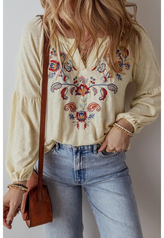 Intricate paisley floral embroidery
  Stylish notch V
  neck design
  Relaxed fit for comfort and ease of movement
  Perfect for adding a feminine flair
  Available in multiple sizes
Material: 65% Polyester 35% Cotton