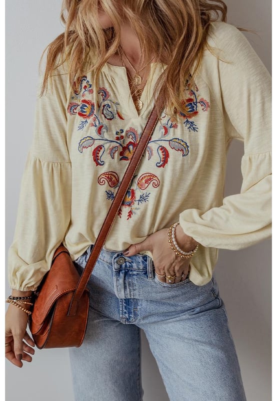 Intricate paisley floral embroidery
  Stylish notch V
  neck design
  Relaxed fit for comfort and ease of movement
  Perfect for adding a feminine flair
  Available in multiple sizes
Material: 65% Polyester 35% Cotton