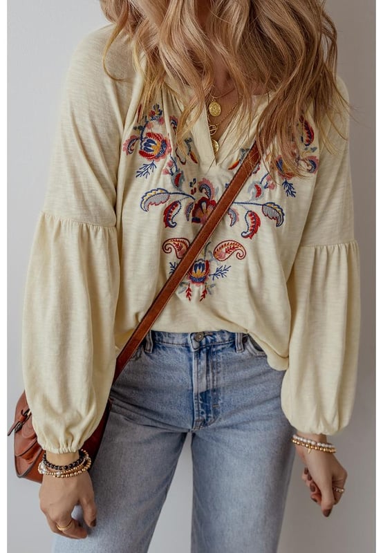Intricate paisley floral embroidery
  Stylish notch V
  neck design
  Relaxed fit for comfort and ease of movement
  Perfect for adding a feminine flair
  Available in multiple sizes
Material: 65% Polyester 35% Cotton