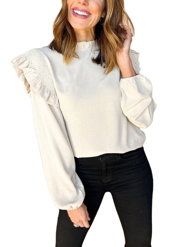 Blusa blanca lisa con diseño de hombros acampanados y fruncidos  
El cuello con volantes añade un toque discreto y elegante  
Diseño de mangas tipo burbuja para un look femenino  
Perfecta para mujeres modernas de diferentes tipos de cuerpo y edades  
Ideal para cualquier ocasión  
Descubre nuestra colección de blusas dropship para mujeres con estilos a la moda y precios atractivos  
Tabla de tallas disponible  
Material: 100% Poliéster