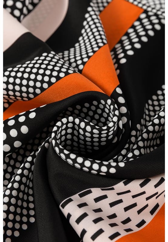 Orange polka dot vertical striped printed blouse
  Loose fit for added comfort
  Playful polka dots for a fun and timeless pattern
  Elegant vertical stripes for a flattering silhouette
  Stylish puff sleeves for a touch of sophistication
  Available in sizes S to XL
Material: 100% Polyester