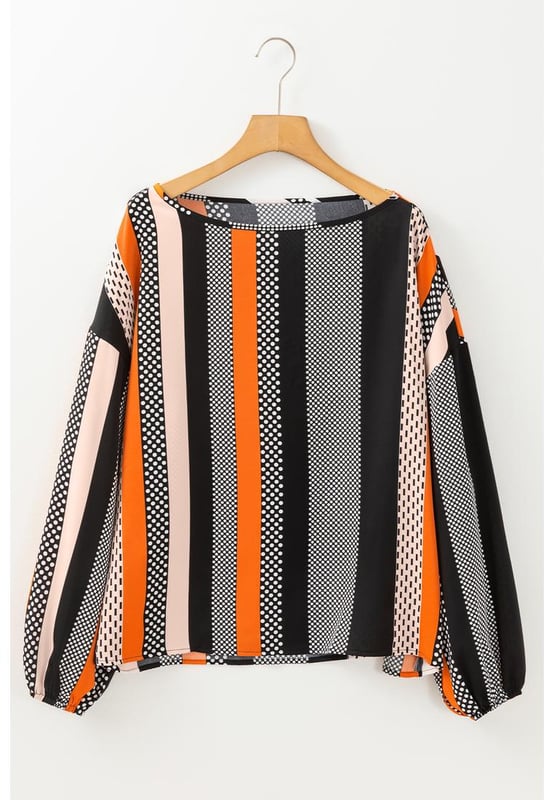 Orange polka dot vertical striped printed blouse
  Loose fit for added comfort
  Playful polka dots for a fun and timeless pattern
  Elegant vertical stripes for a flattering silhouette
  Stylish puff sleeves for a touch of sophistication
  Available in sizes S to XL
Material: 100% Polyester