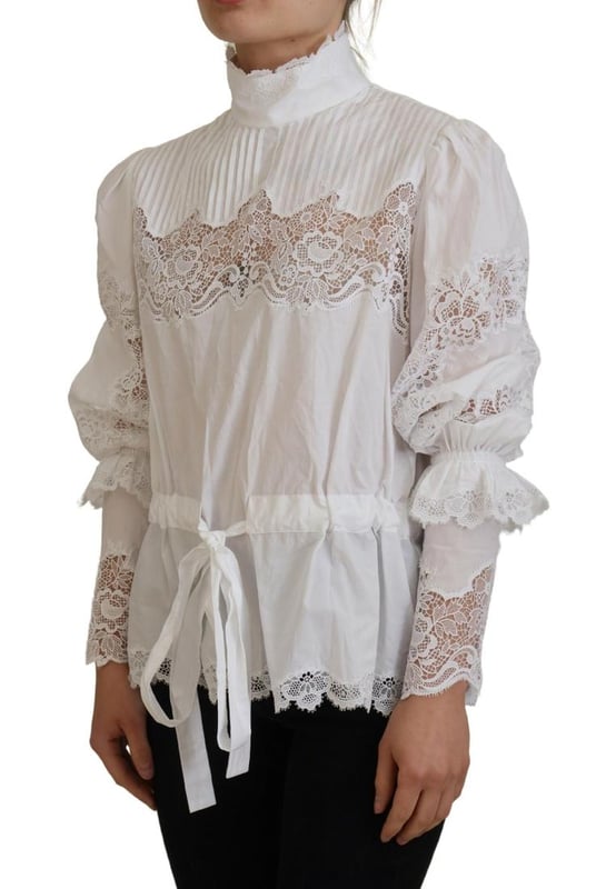 Blusa de algodon 100% autentico de Dolce & Gabbana.
  Top de manga larga.
  Material: 85% algodon 10% nailon 5% poliester.
  Color: Blanco.
  Detalles del logotipo.
  Fabricado en Italia.