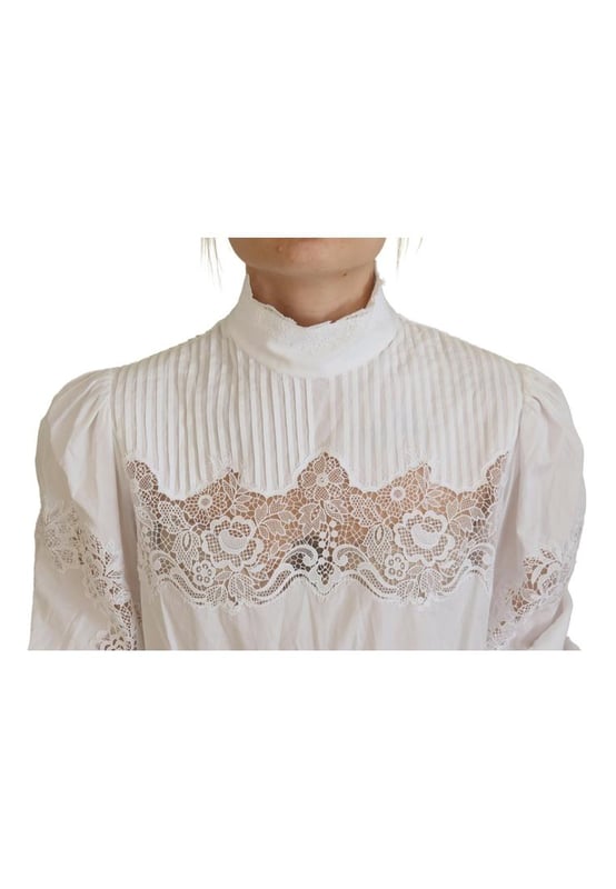 Blusa de algodon 100% autentico de Dolce & Gabbana.
  Top de manga larga.
  Material: 85% algodon 10% nailon 5% poliester.
  Color: Blanco.
  Detalles del logotipo.
  Fabricado en Italia.