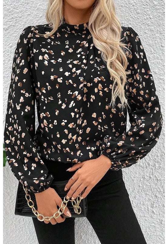 Black Leopard Print Lantern Sleeve Mock Neck Pleated Blouse
  Mock neck design
  Eye
  catching leopard pattern
  Stylish lantern sleeves
  Flattering pleated detailing
  Perfect for casual outings and special occasions
  Available in sizes S M L XL
Material: 100% Polyester