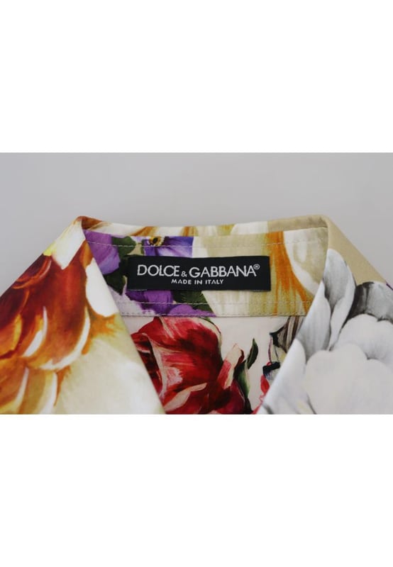 Brand new with tags
  100% Authentic Dolce & Gabbana
  Floral collared long sleeves top
  Made in Italy
  Multicolor floral print
  Button front closure
  Logo details
  Material: 100% Cotton
  Gender: Women